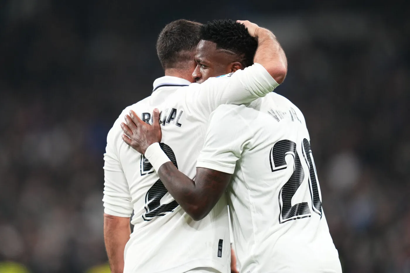  Dani Carvajal and Vinicius Junior celebrate a goal during the 2022 UEFA Champions League final between Real Madrid and Liverpool at the Stade de France in Saint-Denis, France.