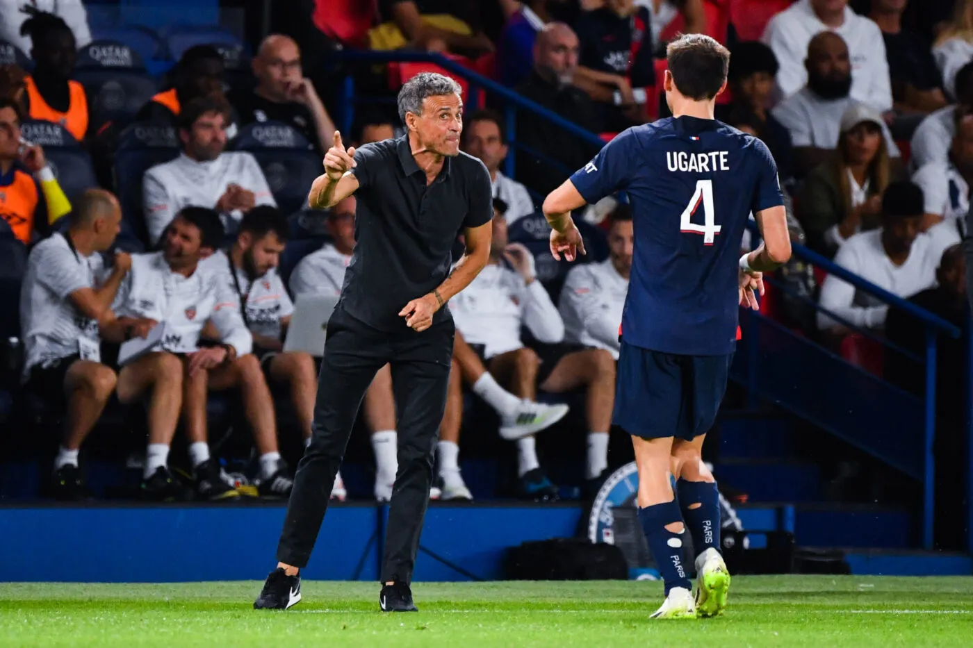 Head coach Luis ENRIQUE of PSG and Manuel UGARTE of PSG during the Ligue 1 Uber Eats match between Paris Saint Germain and FC Lorient at Parc des Princes on August 12, 2023 in Paris, France. (Photo by Sandra Ruhaut/Icon Sport)