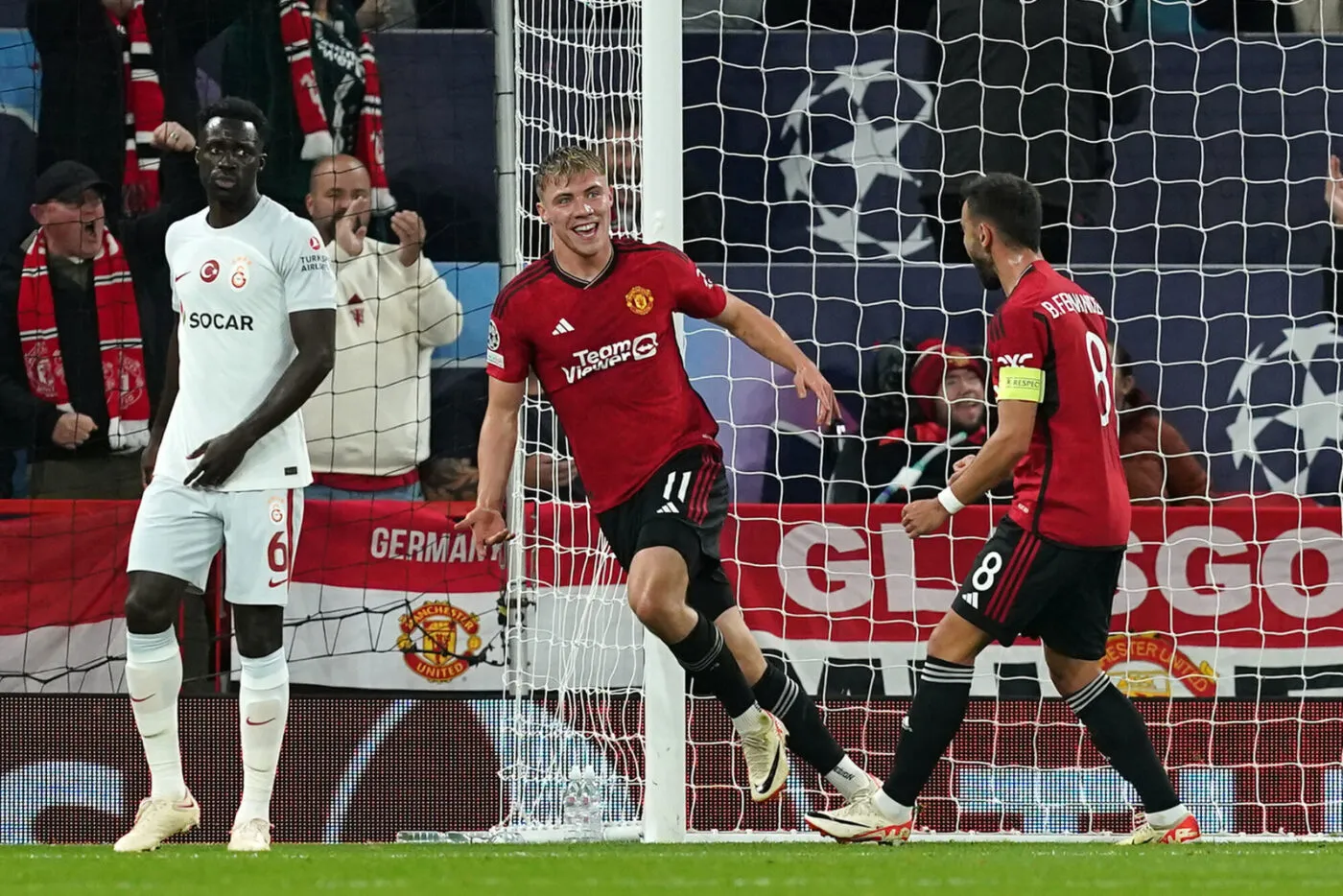 Manchester United's Rasmus Hojlund (centre) celebrates scoring their side's first goal of the game during the UEFA Champions League Group A match at Old Trafford, Manchester. Picture date: Tuesday October 3, 2023. - Photo by Icon sport