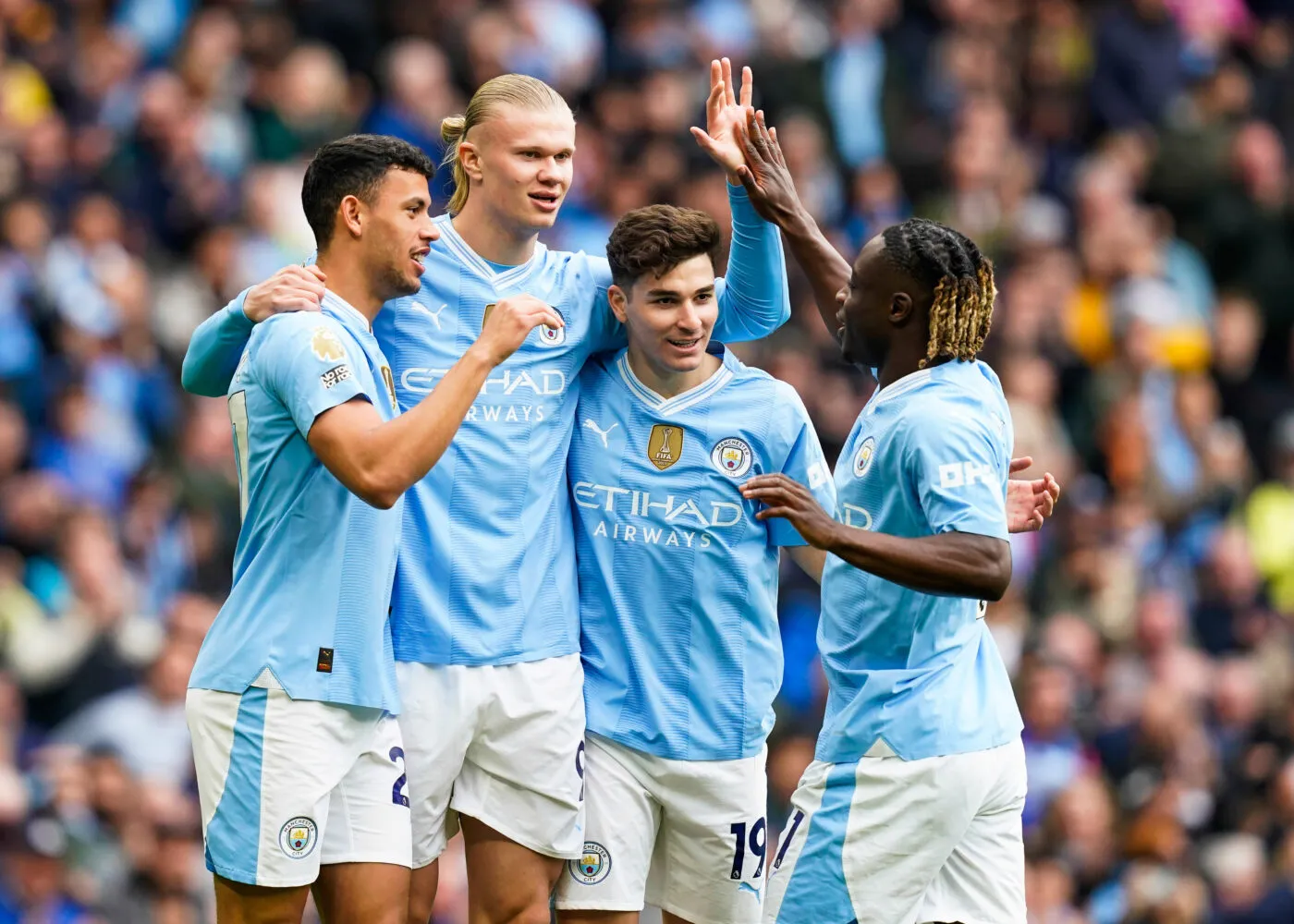 Manchester, England, 13th April 2024. Erling Haaland of Manchester City (2l) smiles after scoring the opening goal  during the Premier League match at the Etihad Stadium, Manchester. Picture credit should read: Andrew Yates / Sportimage   Photo by Icon Sport   - Photo by Icon Sport