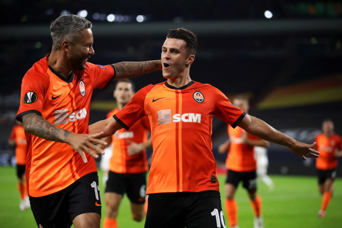 GELSENKIRCHEN, GERMANY - AUGUST 11: Junior Moraes of Shakhtar Donetsk celebrates with teammate Marlos after scoring his sides first goal during the UEFA Europa League Quarter Final between Shakhtar Donetsk and FC Basel at Veltins-Arena on August 11, 2020 in Gelsenkirchen, Germany. (Photo by Alex Grimm - UEFA/POOL/ICON SPORT)   - Photo by Icon Sport