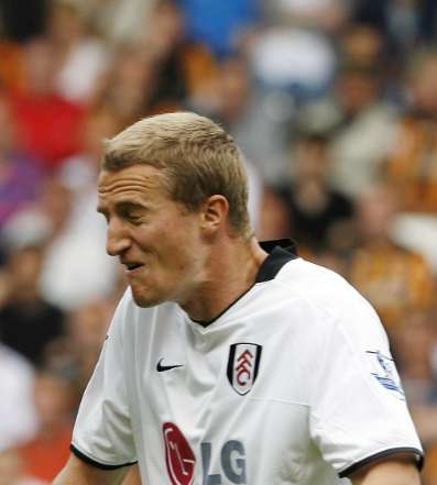 Hodgson content de garder Hangeland