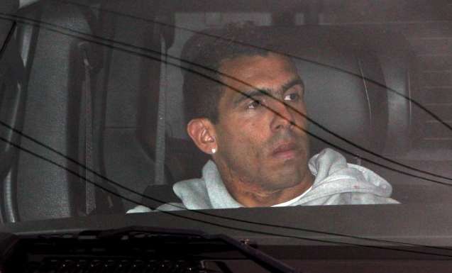 Photo : Tevez ravi de rentrer à Manchester