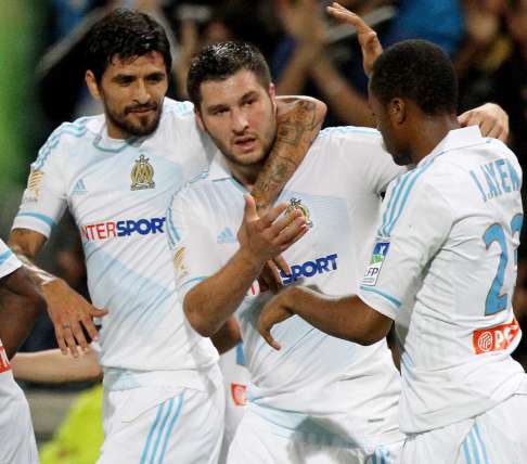 L&rsquo;OM cartonne Lens