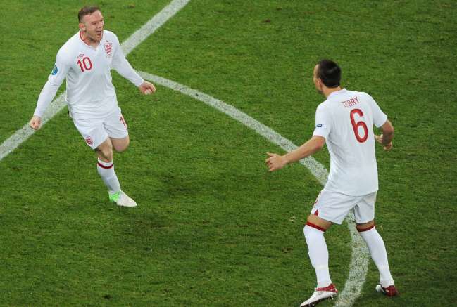 Rooney signe son retour