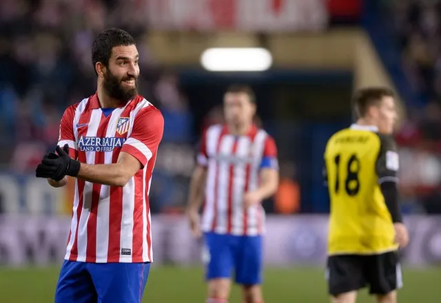 Arda Turan aime Wenger